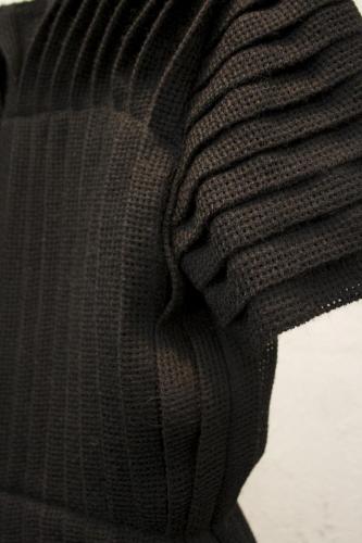 Detalj handvävt ylletyg